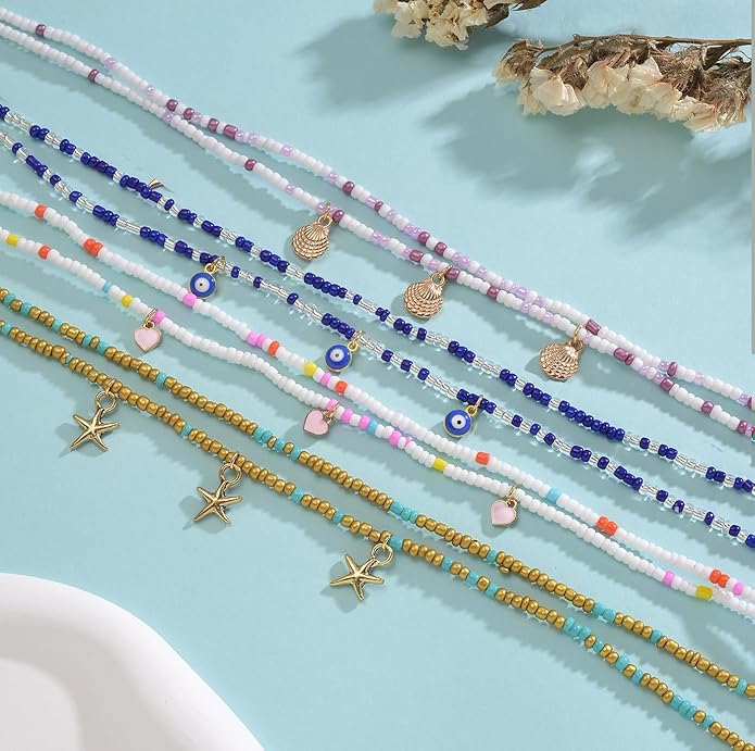 Tornito 8Pcs 31.5 Inches African Waist Bead Chain Elastic Belly Beads Butterfly Shell Layered Body Chain Colorful Jewelry Accessories for Women