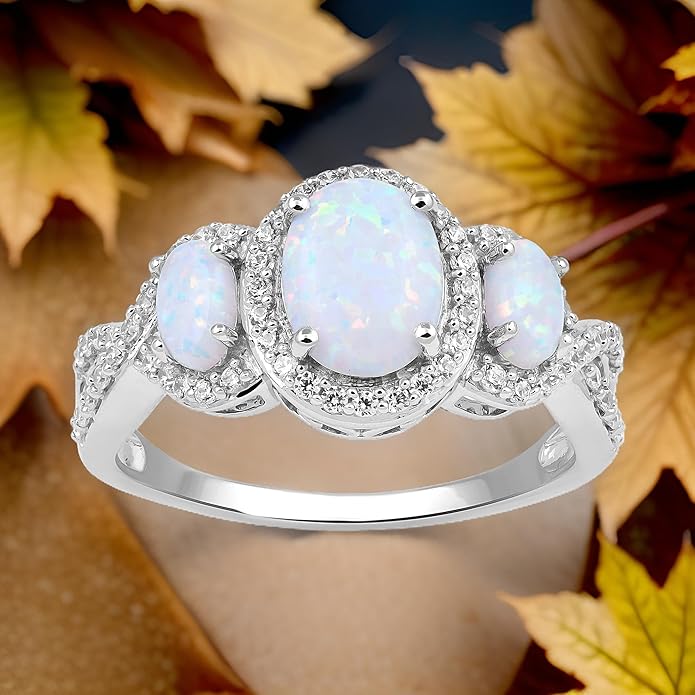 Jewelili Sterling Silver 8X6 MM and 5X3 MM Oval Created Opal and Round Created White Sapphire 3-Stone Engagement Ring